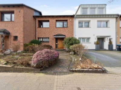 Reihenmittelhaus im Splitlevel mit großem Garten und Garage in zentraler Lage von Langefeld-Richrath