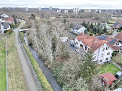 WOHNEN AM FLUSS � Charmante Etagenwohnung mit Wintergarten und Top-Anbindung!