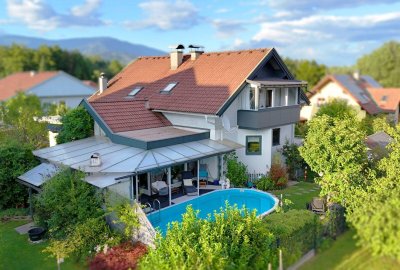 Familienparadies in Villach: Haus mit Pool, Wintergarten und gepflegtem Garten