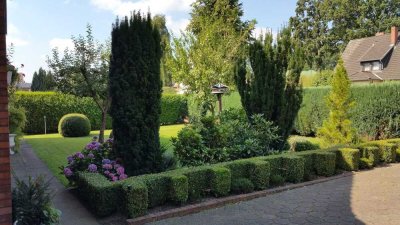 Außergewöhnliche DG Wohnung mit großem Gartenanteil