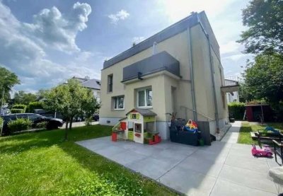 Helle & gepflegte Terrassenwohnung mit Garten