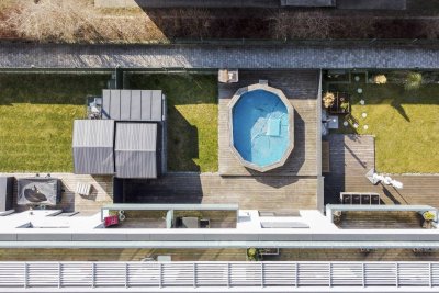 Familientraum - Stylische Gartenwohnung mit Bergblick, Pool und zwei Garagenplätze