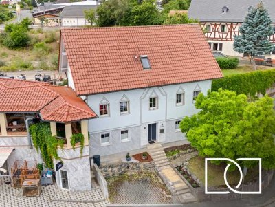 Einzigartige Gelegenheit! Stilvolles Mehrfamilienhaus mit separaten Zugängen in zentraler Lage