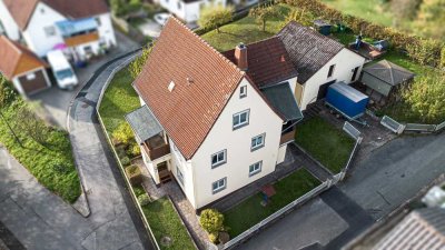 Großes Wohnhaus mit schönem Garten und Nebengebäude mit Garage in Weidach!