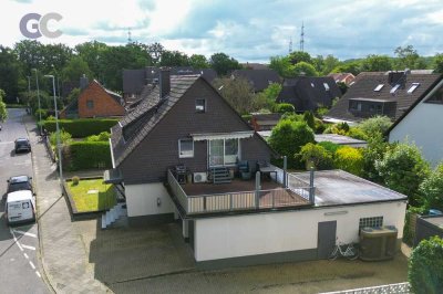 Großes Zweifamilienhaus mit drei Garagen, großer Dachterrasse  und tollem Südgarten in Top-Lage in H