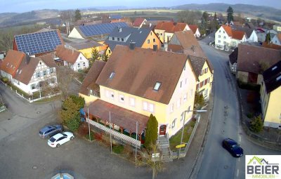 Großzügiges Mehrfamilienhaus mit Gewerbeeinheit in zentraler Lage