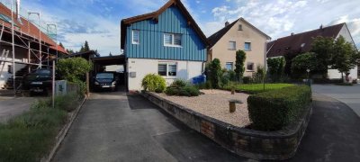 Einfamilienhaus mit Carport Terrasse Teich