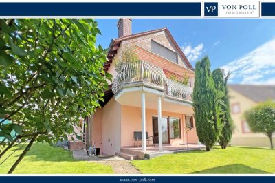 Lichtdurchflutete Erdgeschosswohnung mit Terrasse und zauberhaftem Garten