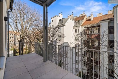 Sanierte 2-Zimmer-Altbauwohnung mit Balkon in Top-Lage