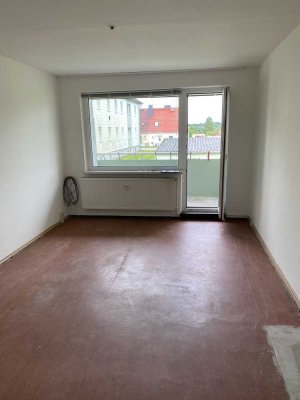 Erdgeschosswohnung mit Balkon und Stellplatz vor der Tür