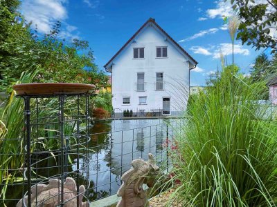 Modernisiertes Wohnhaus mit schönem Garten