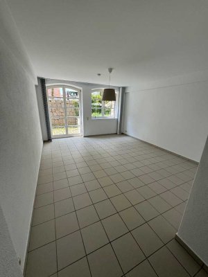 Geschmackvolle, modernisierte 1,5-Zimmer-Souterrain-Wohnung mit Balkon und Garten in Muggensturm