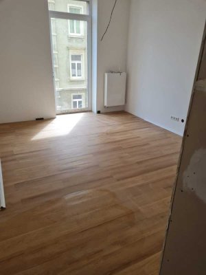 Schicke 2-Zimmer Wohnung mit großer Wohnküche im Erstbezug Zustand