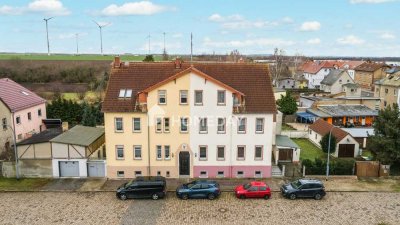 Investieren und gestalten: MFH in Lützen mit 3 Wohnungen, Garten, Garage und großzügigem Grundstück