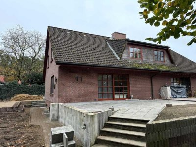 Attraktive DHH mit Vollkeller, West Terrasse und Doppelcarport in ruhiger grüner Ortslage