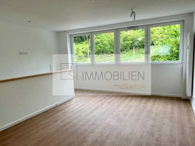 Lichtdurchflutete 3-Zimmer-Terrassenwohnung mit Einbauküche