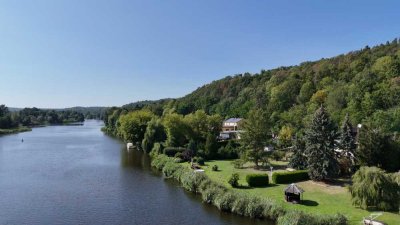 Direktes Wassergrundstück mit Einfamilienhaus