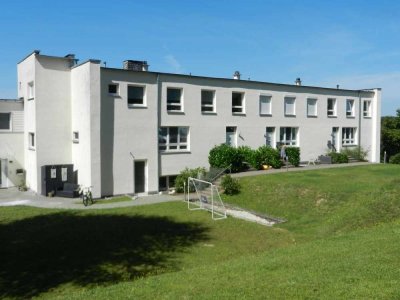 Perfekte Wohnung mit Reihenhaus-Feeling - Toller Blick und viel Grün