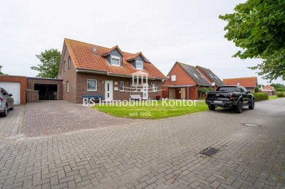 Upleward-Trockenstrand! Renovierte Doppelhaushälfte mit Garage, Gartenanlage und Terrasse