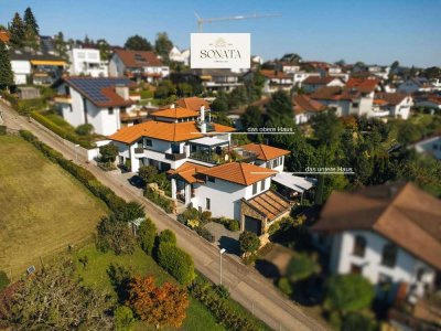 Eindrucksvolles Zweifamilienhaus mit Aufzug, Spa, Rooftop-Oase und atemberaubendem Panorama