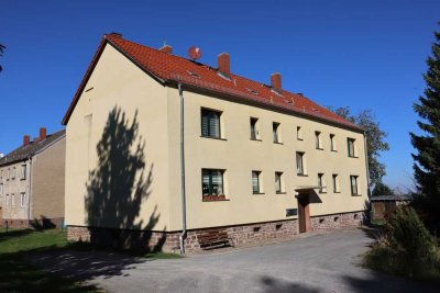 Charmante Zweiraumwohnung mit privatem Garten und Garage – Perfekt für Naturliebhaber!