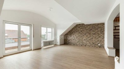 Sofort frei! Charmante 2-Zimmer-Maisonettewohnung mit Balkon, EBK und Stellplatz in zentraler Lage