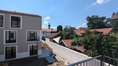 Erstbezug: gehobene 3-Zi-Wohnung mit großem Balkon, Keller und TG-Stellplatz in bester Lage