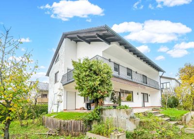 Ansehnliches Einfamilienhaus mit Garage und Garten in Karlstadt zvk., Bj 1977, ca. 204m² Wfl.