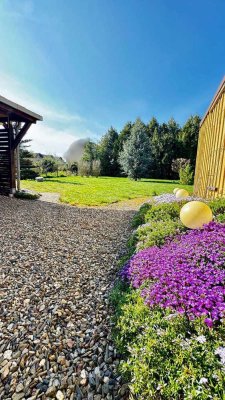 Viel Platz für Ihre Ideen – Einfamilienhaus mit Flair, Gartenparadies und separater Nutzungseinheit