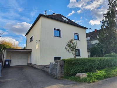 Schönes Einfamilienhaus mit Garage und Garten in bester Lage!