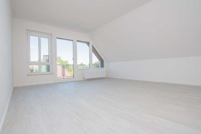 Helle Dachgeschosswohnung mit Balkon im Ortskern von Kleinenbroich