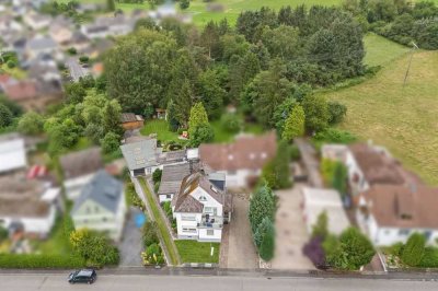 Mehrgenerationenhaus auf einem besonderen Grundstück mit großer Garage und vielen Möglichkeiten!!