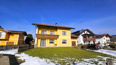 Wohnung im Zweifamilienhaus mit großem Garten und Garage