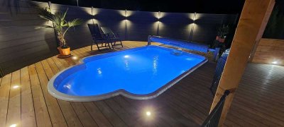 Familienidyll mit Wohlfühlfaktor: Reihenendhaus mit Pool und Traumgarten