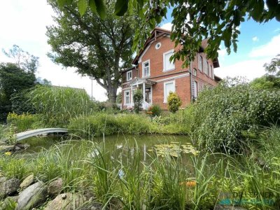 Charmantes Zweifamilienhaus mit idyllischem Gartenbereich!