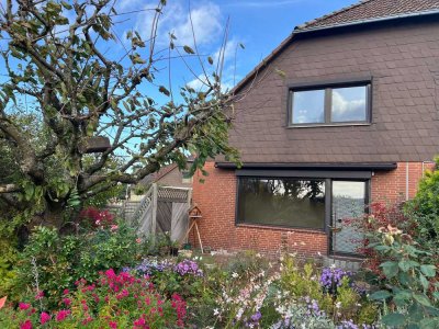 Gepflegte Doppelhaushälfte in Bevenrode mit Carport, Vollkeller und grundsolider Klinkerfassade