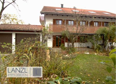 Idylische Terrassenwohnung mit großem Gartenanteil