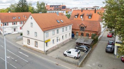 Zentral und vielseitig : 4-Familienhaus mit Werkstatt in Top-Lage !