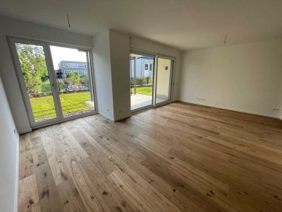 2-Zimmer-Wohnung mit Einbauküche, Privatgarten & Tiefgaragenplatz