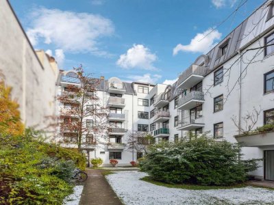 Perfekt geschnittene 1-Zimmer-Wohnung mit ruhigem Balkon und Blick ins Grüne in München-Westend