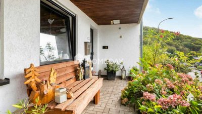 Lichtdurchflutetes Einfamilienhaus mit großem Garten und Ausbaupotenzial in ruhiger Hanglage