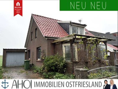 Renovierungsbedürftiges Einfamilienhaus (nicht freistehend) mit Terrasse, Garage und beeindruckendem