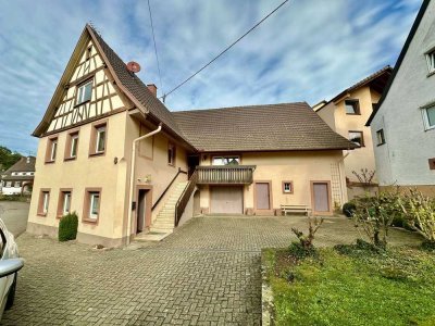 RESERVIERT - Einfamilienhaus mit Garage, Nebengebäude & großzügigem Grundstück