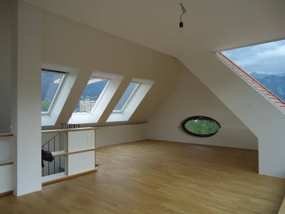 Außergewöhnliche Dachgeschosswohnung mit großartigen Terrasse