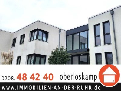 Neuwertige 3,5-Zimmer-EG-Wohnung mit Garten und großer SW- Terrasse und TG-SP in grüner Lage!