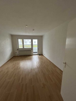 Perfekte Familienwohnung: Tolle 3 Zimmer Wohnung mit Balkon, ideal für eine kleine Familie.