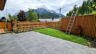 Neuwertige 4 Zimmer-Wohnung mit überdachter Terrasse und Gartenbereich!