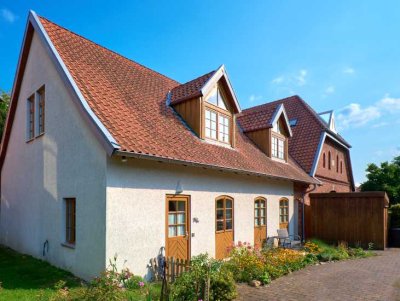 Wohnen mit Charme! Eigentumswohnung in Doppelhaushälfte mit Garten inklusive 2 kleinen Terrassen.