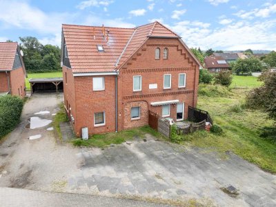 Mehrfamilienhaus auf dem Lande mit Feldrandlage