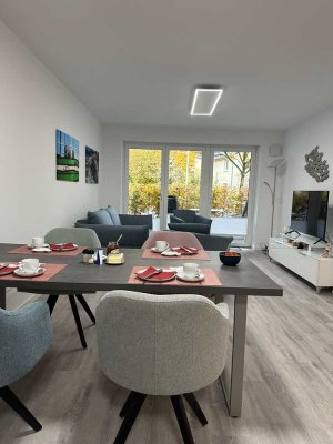 Geschmackvolle 2,5-Zimmer-EG-Wohnung mit gehobener Ausstattung, TG-Stellplatz, Terrasse und EBK